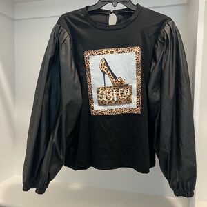 Black Top with Leopard Print Design